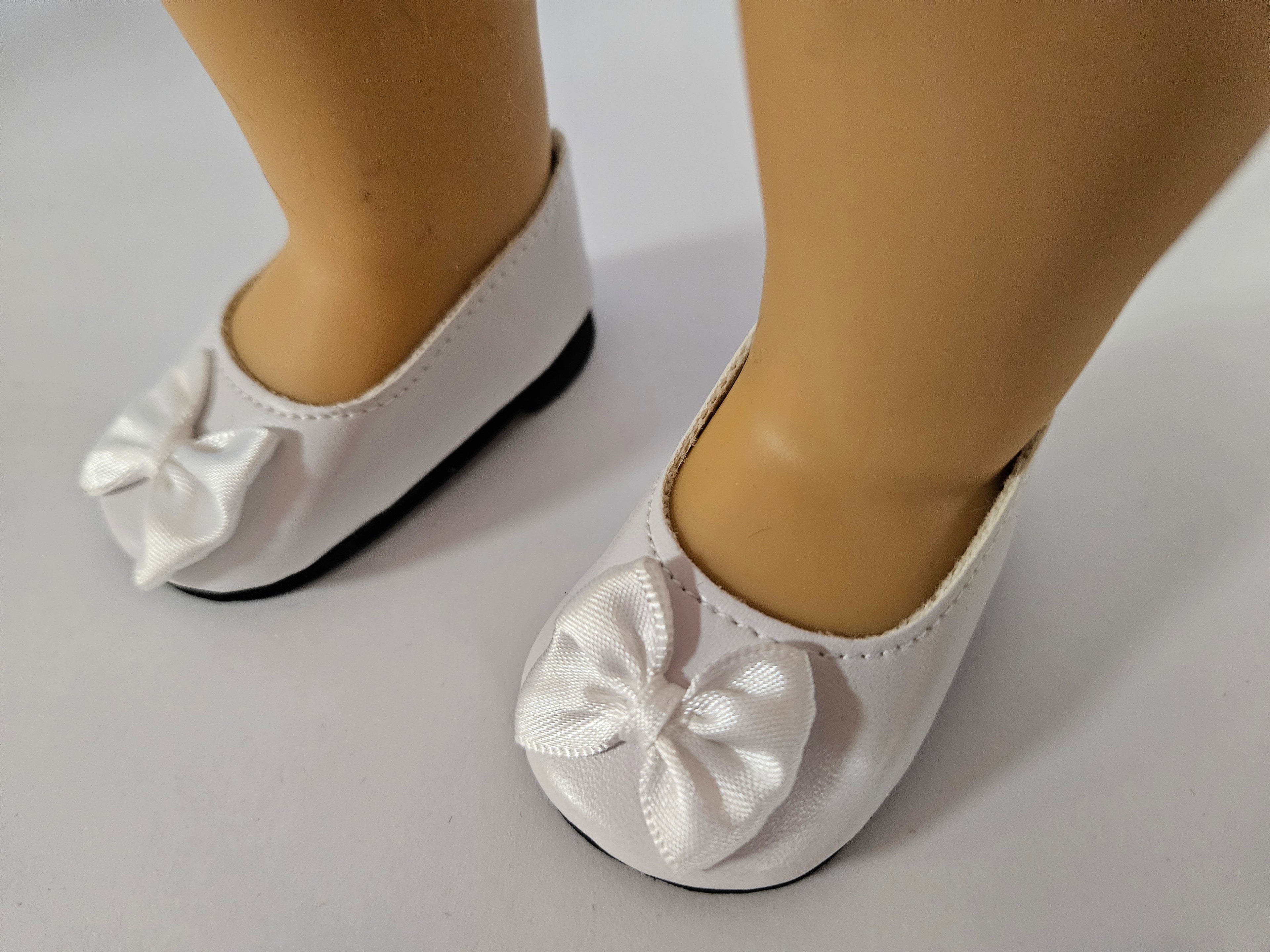 White Slip On Shoes with a Bow for the 18 inch doll